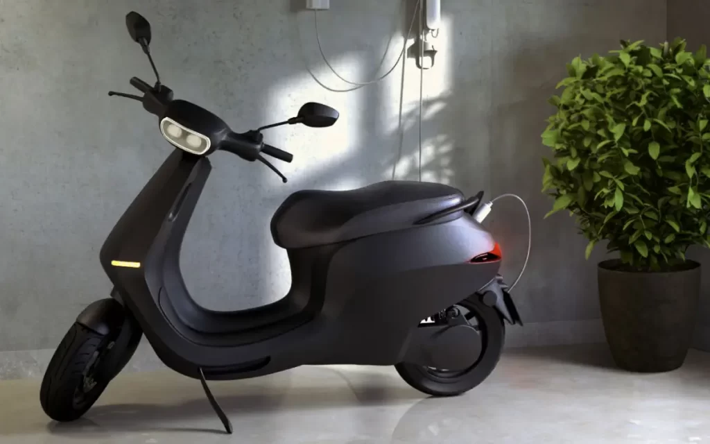 Ola electric scooter riding in cold winter conditions on city roads